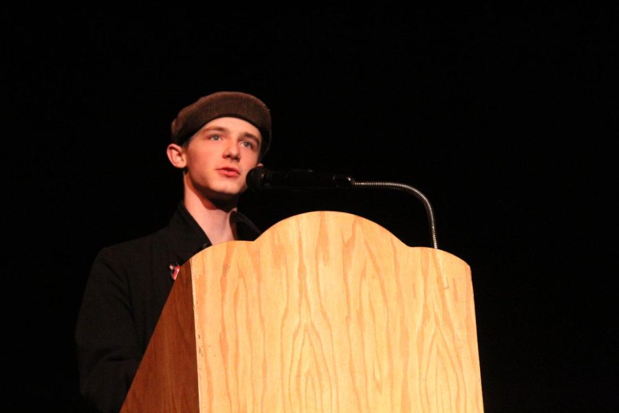 Senior Maverick Aggson reads his poem aloud.