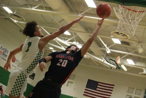 Senior Tate Brown blocks the ball at SubState.