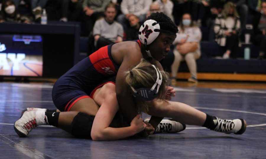 Senior Dache Island-Jones wrestles her Marysville opponent on senior night on Feb. 3. Island-Jones won her match while the team lost 6-18.