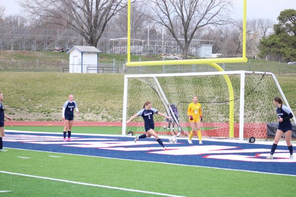 Soccer battles back to beat Topeka 2-1