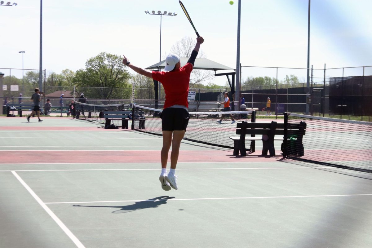 Tennis takes first at Topeka High Invitational
