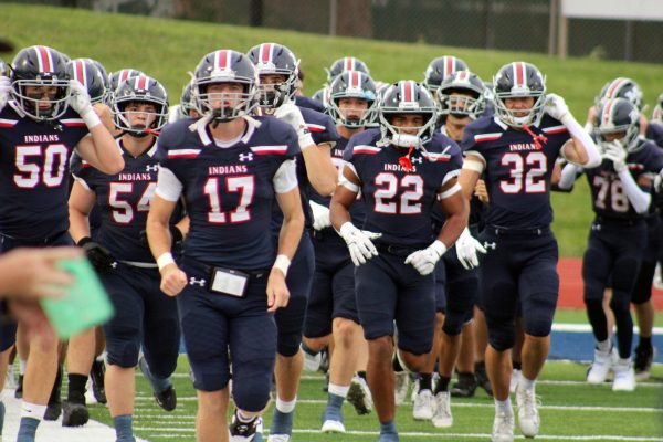 Football. Manhattan High school getting ready for their game against Garden City. Manhattan Indians hyped up for their first game of the season beating Garden City 47-14.