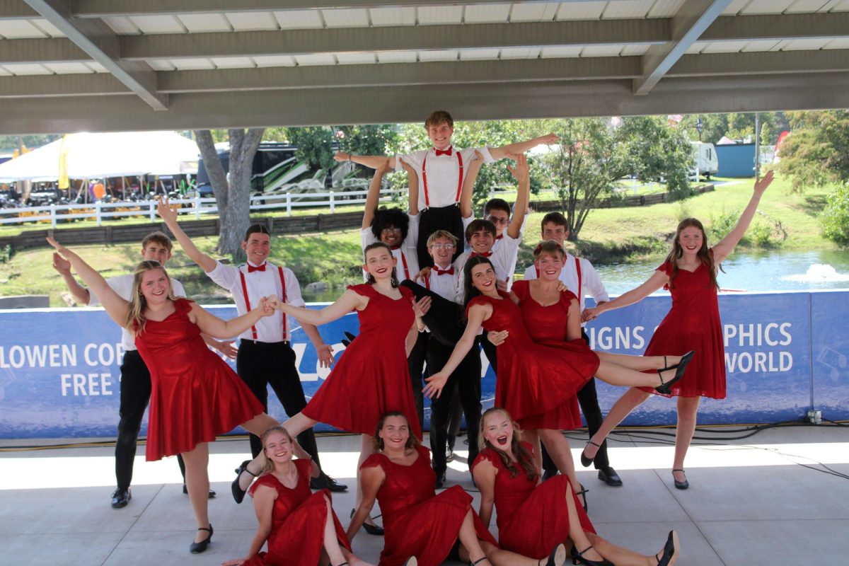 Hold the Pose. Pops choir strikes their ending pose after the final song of their seventeen minute medley performance. This performance includes seven songs: five group, one mens song and one women's song. 