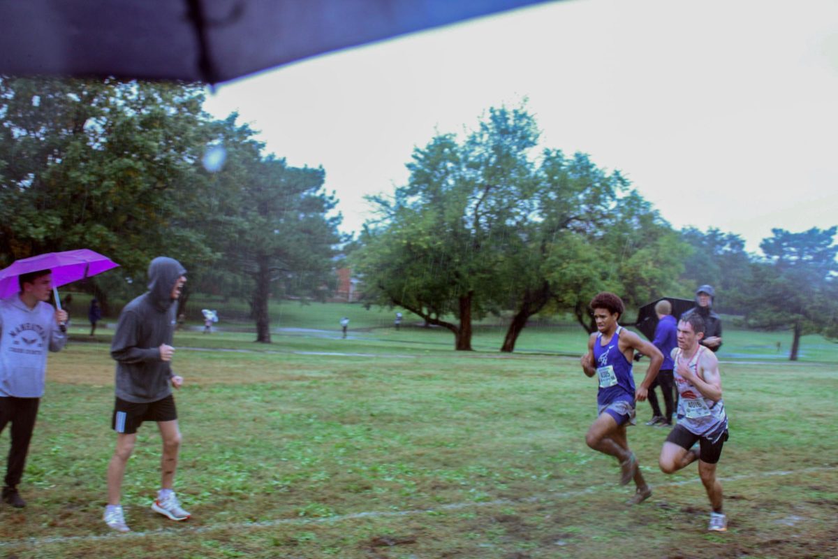 Go Kyler! Kyler Grogg sprints toward the finish line getting In front of the JC runner. Kyler helped Manhattan get first place at Regionals. 