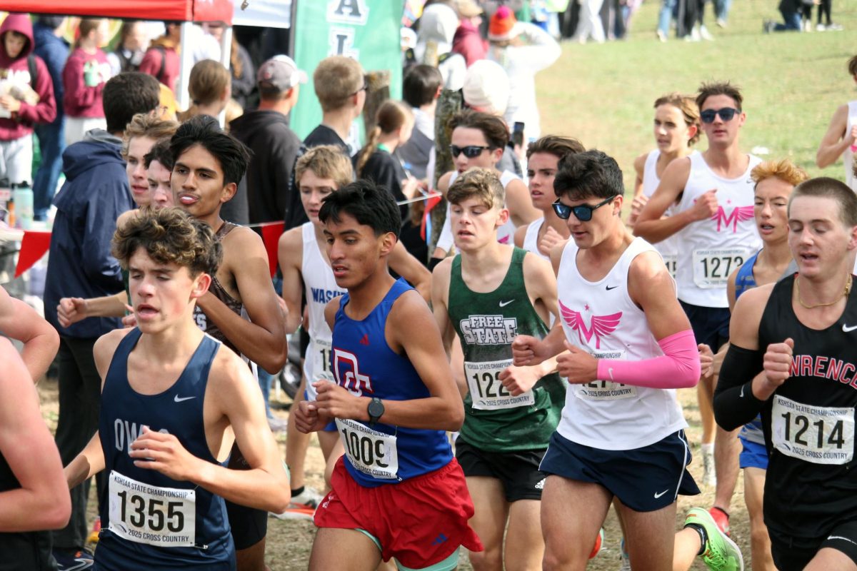 Go Patric! Patric Husher in the pack. Patric Husher helped Manhattan get 8th place in state which is better than last years where they got 10th. 