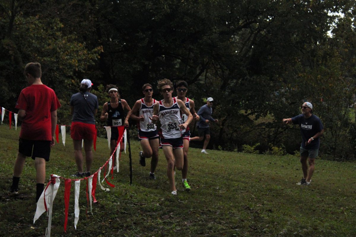 Go Manhattan! Will Richarrds, Patrick Huser, and Benjamin Huser in a Manhattan pack. They all did well and helped Manhattan get 3rd Place. 