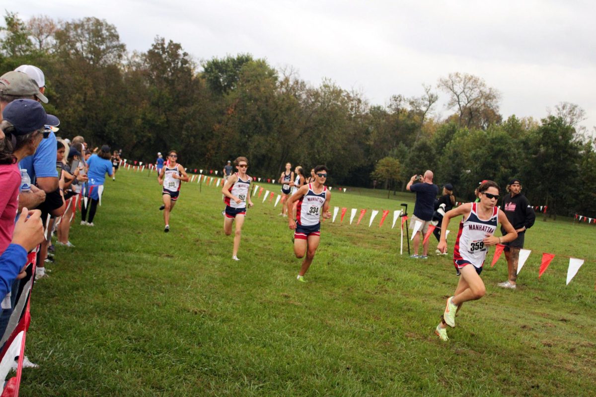 Finish! Jackson weeler and others sptints tword the finish line. Everybody helped Manhattan get 3rd in league. 