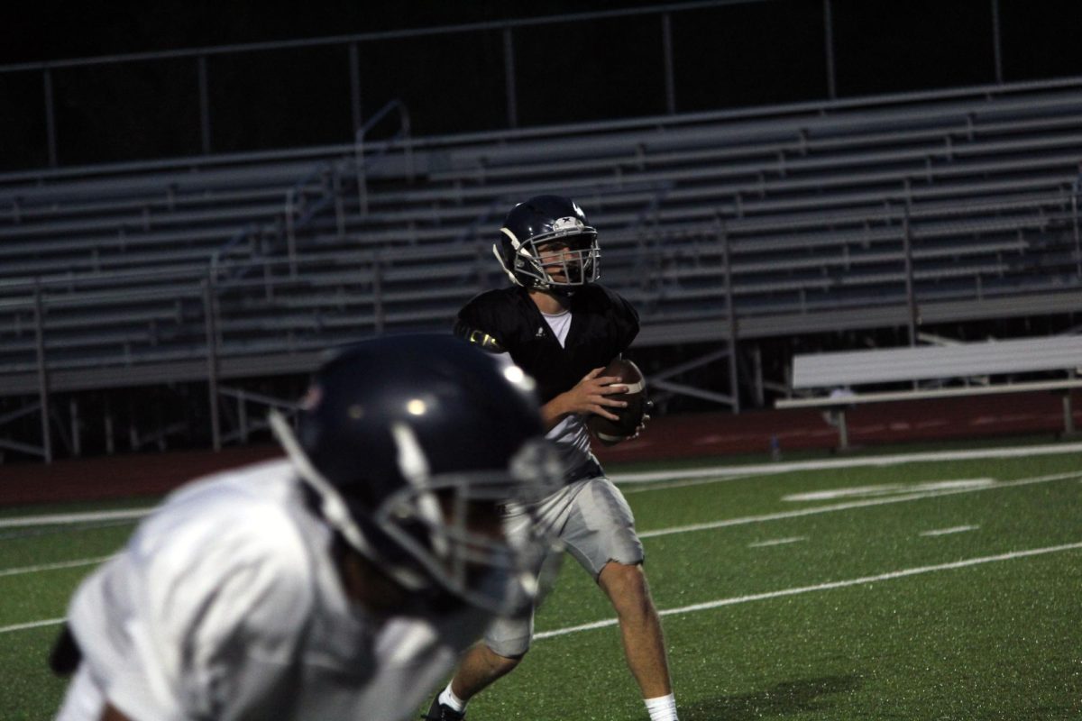 Run!! The quarterback going out of the pocket so that he can run the ball. 