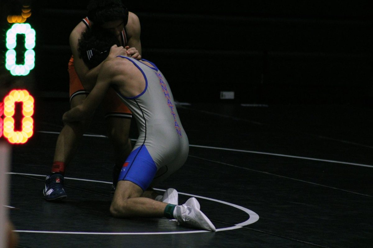 Takedown! Freshman Lio _____ taking down an Opponent. Lio won his mach helping manhattan win the tornement. 