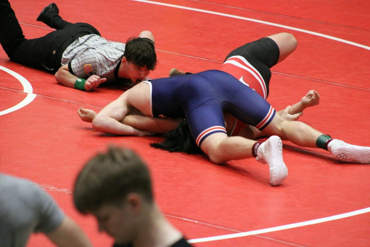 Tweet! the Reff blose the wistle as Senor Hunter Flagg pins an Emporia wrestler. Hunter Won his braket.