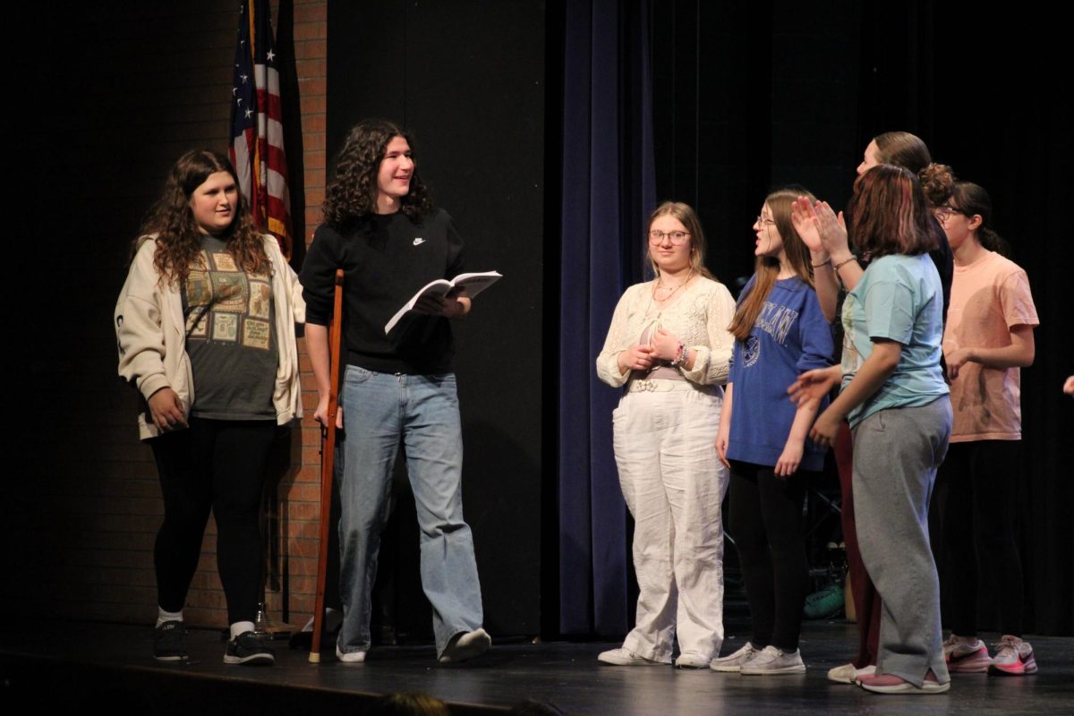 Back into action. In Rezac, MHS Students rehearse the scene where the character Crutchie comes back from jail, after being arrested for being in a big fight. This musical was rehearsed on Feb. 25, 2026, and will be performed on Mar. 6, 7 and 8.