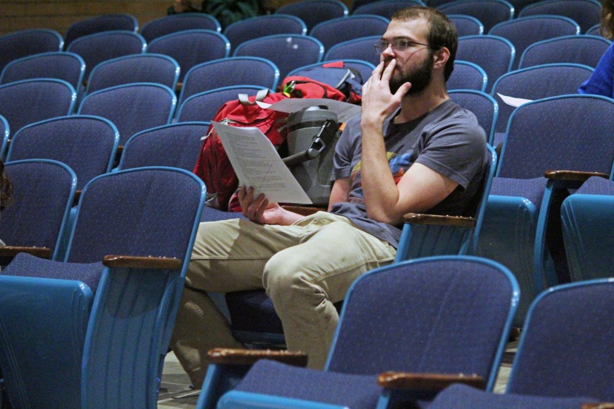 Start of something new. In Rezac Auditorium, senior Silas Mire is reading through the script of what will be the spring play, where the drama teacher, Ginny Pape, holds auditions for the show. the play is called Proofs; it is a four person play where a mathematician has dementia, and his daughter is trying to figure out what to do with a lost but now found proof