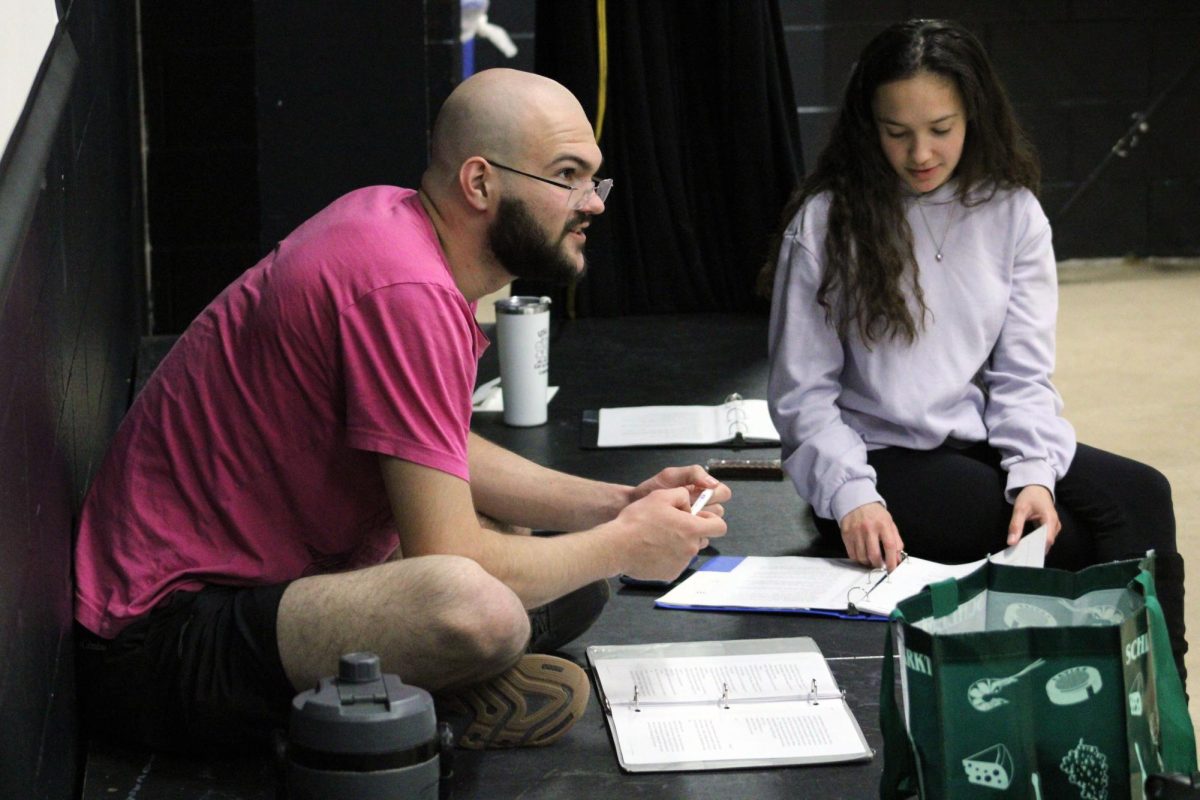 Bold and Bald. Senior Silas Mire sits and comments on the actors as he reads along on the script. This was during the tech day for the MHS spring play, Proofs, where the actors rehearse and work on memorizing their lines while the crew members prep the stage and costume for the big show day. The tech day was on Apr. 26.