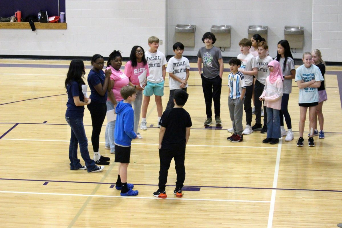 2 vs everyone else! Two of the middle schoolers stood on a different end than their classmates for one of the questions the visiting MHS SADD members had asked for one of the games the kiddos get to play. The SADD Members visited the middles schools to talk to the students about health safety with addiction and with physical health, such as dealing with bullies.