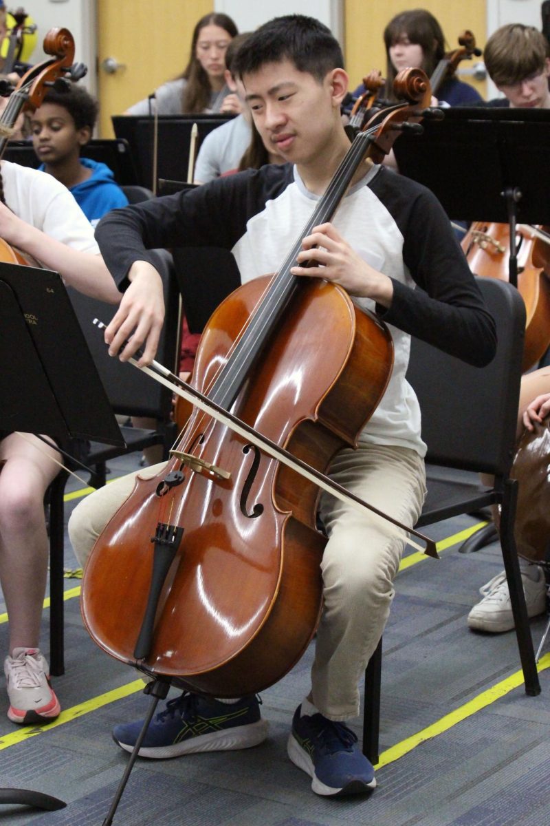 Hello Cello! Junior Solon Xia rocks out on the cello while playing with the Anthony Middle School Orchestra during the Manhattan High School Symphonic Orchestra visits to the middle schools. These awesome students play their hearts out in an ensemble that has double the number of players than before! The High Schoolers visit to AMS was on Mar. 31, during the school day.
