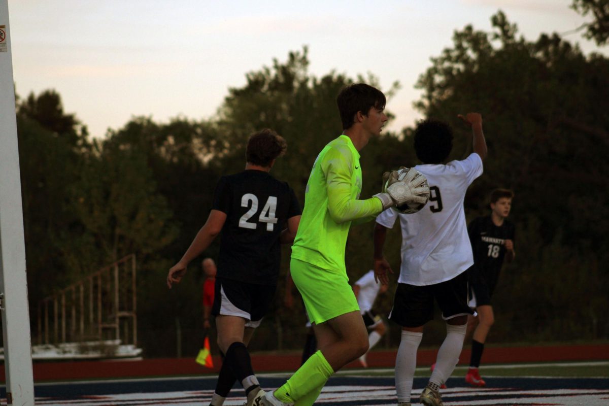 Nice catch. Finn Nelson of grade 11, goal keeper on the boys varsity soccer team, caught the ball before it went into our goal. 