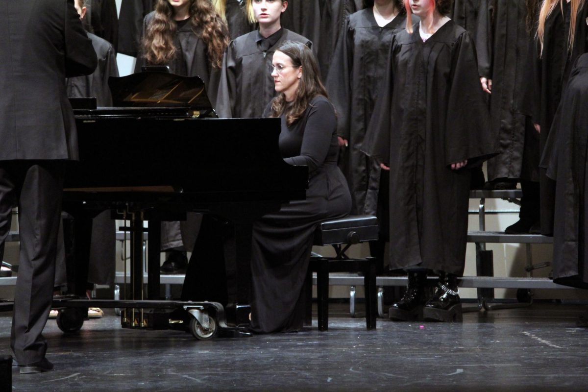 One last hurrah. The beloved accompanist of the Manhattan high School performing arts, Cheryl Savage, played on the school piano for the last time for the MHS Final Choir Concert on May 13. She will be missed by all, those who have known her for 4+ years, and those who have only met her this year.