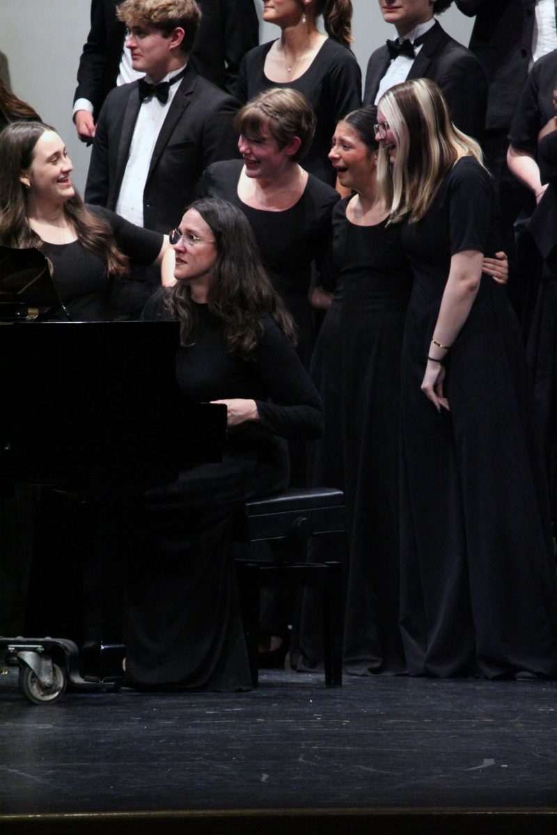 Happy, yet sad tears. The Manhattan High School Chamber Choir hold each other close as the seniors take their last bows as a singer in the MHS Choirs. This was on May 13, during the MHS Final Choir Concert that took place in Rezac Auditorium. 
